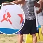 Поліція Полтави ідентифікувала чоловіків, які фотографувалися з прапором СРСР